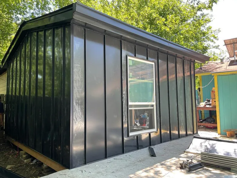 Black standing seam metal wall panels for Metal Roof Installation in Omaha