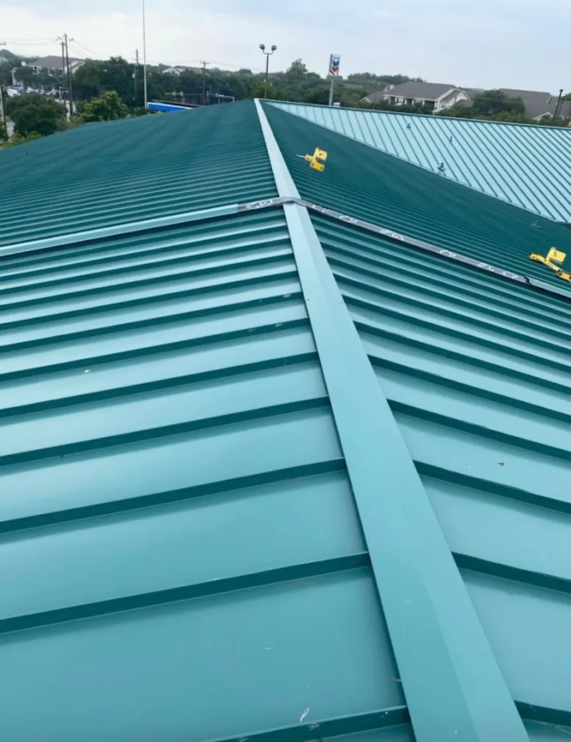 Green commercial metal roof ridge and valley for Metal Roof Repair in Omaha